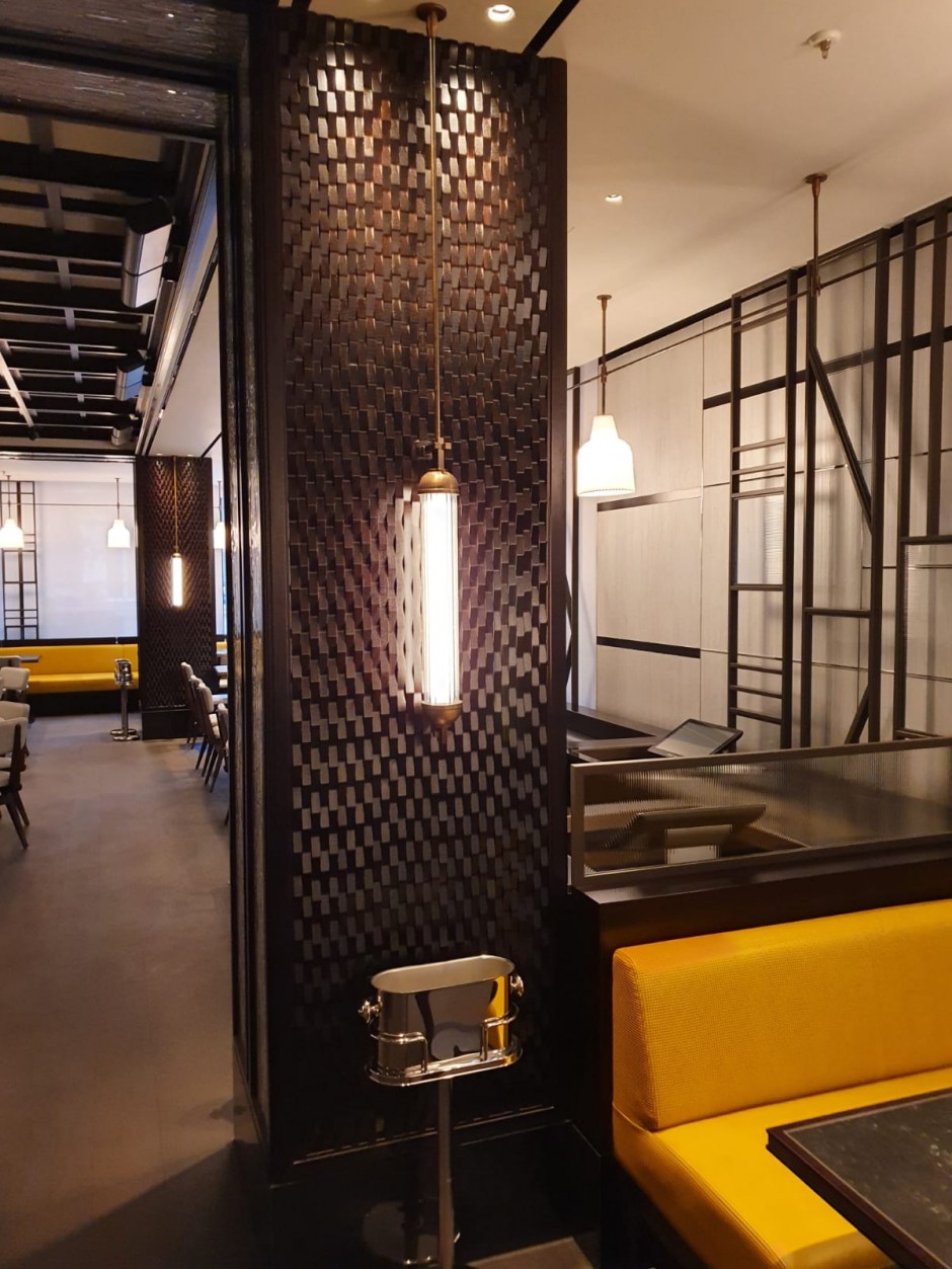 Bespoke wave-form timber column at Nobu Restaurant